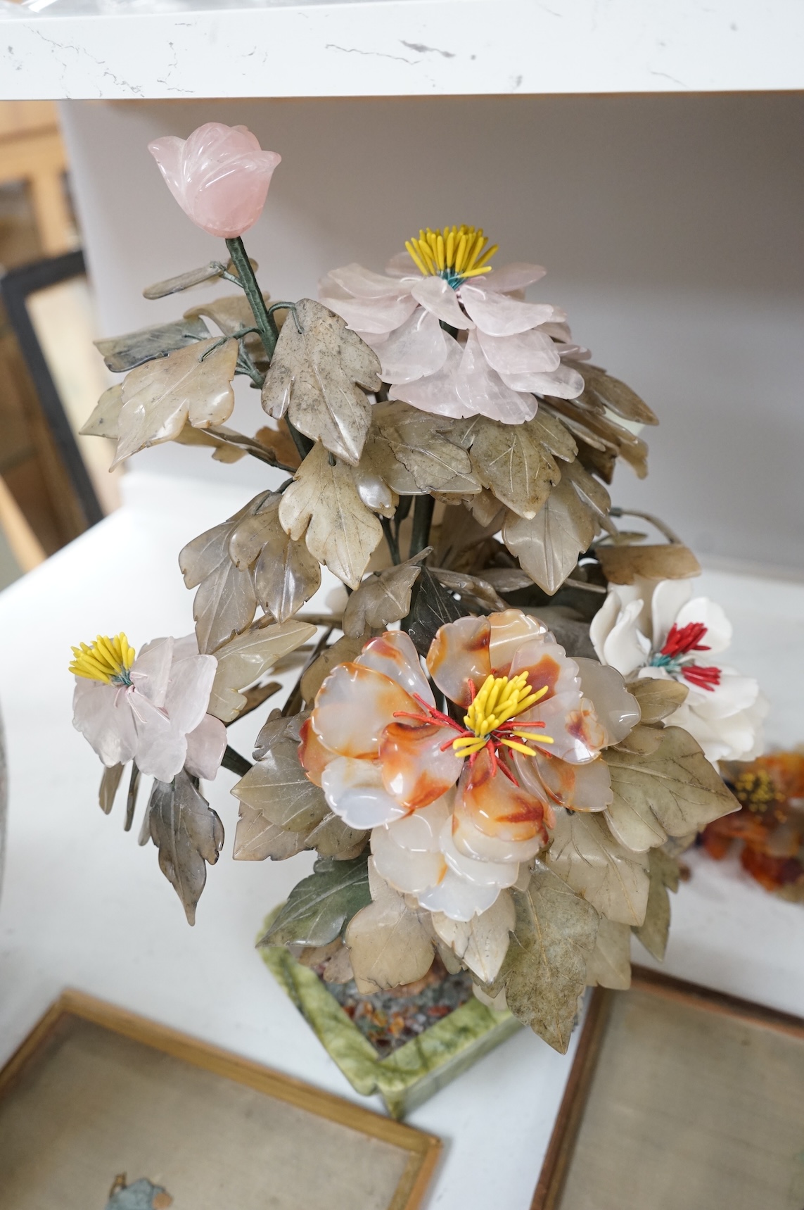 A Chinese carved hardstone and semi-precious stone plant, 44cm high